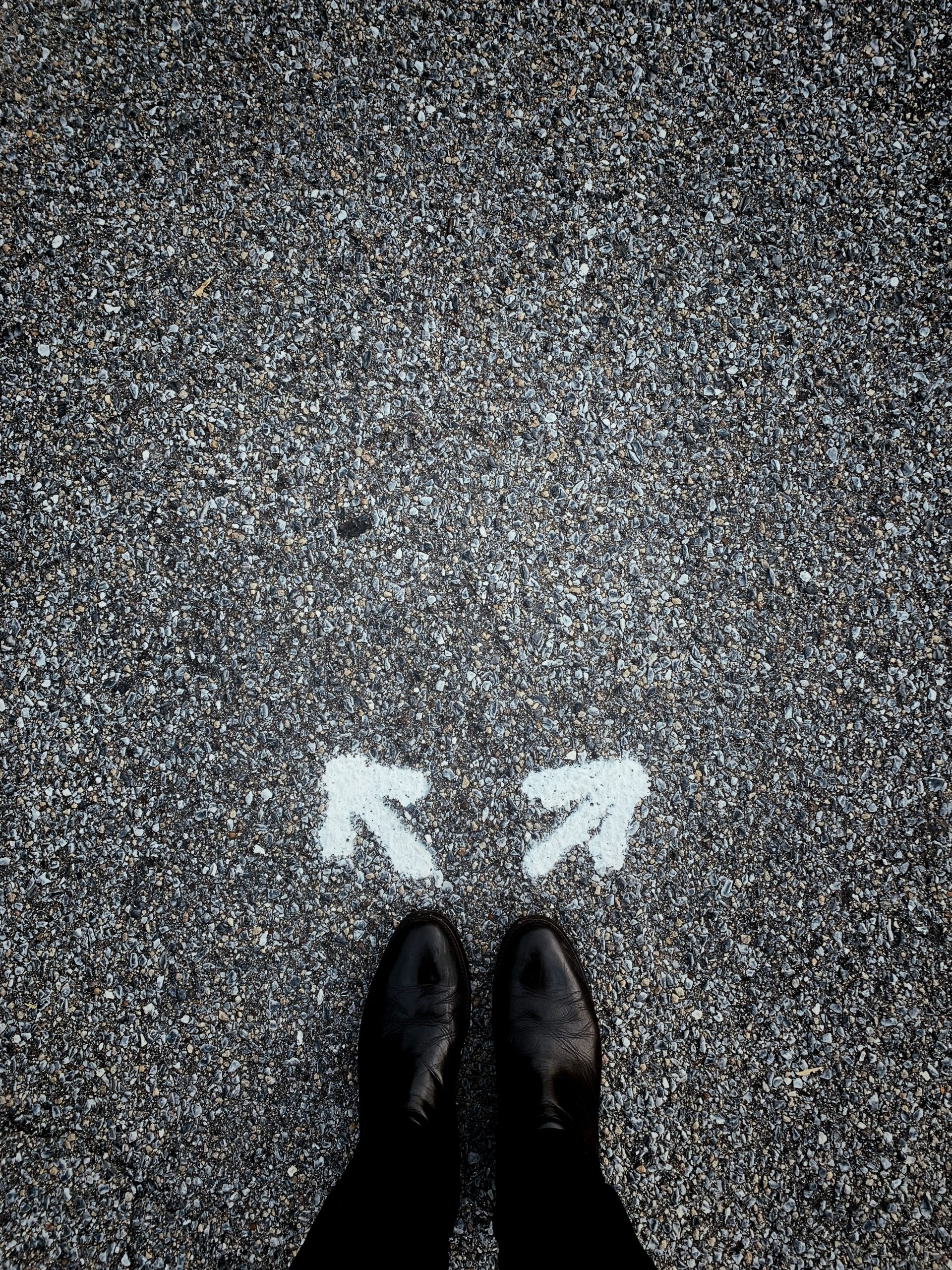 Beta readers vs. editors: Which do I need? feet with two arrows